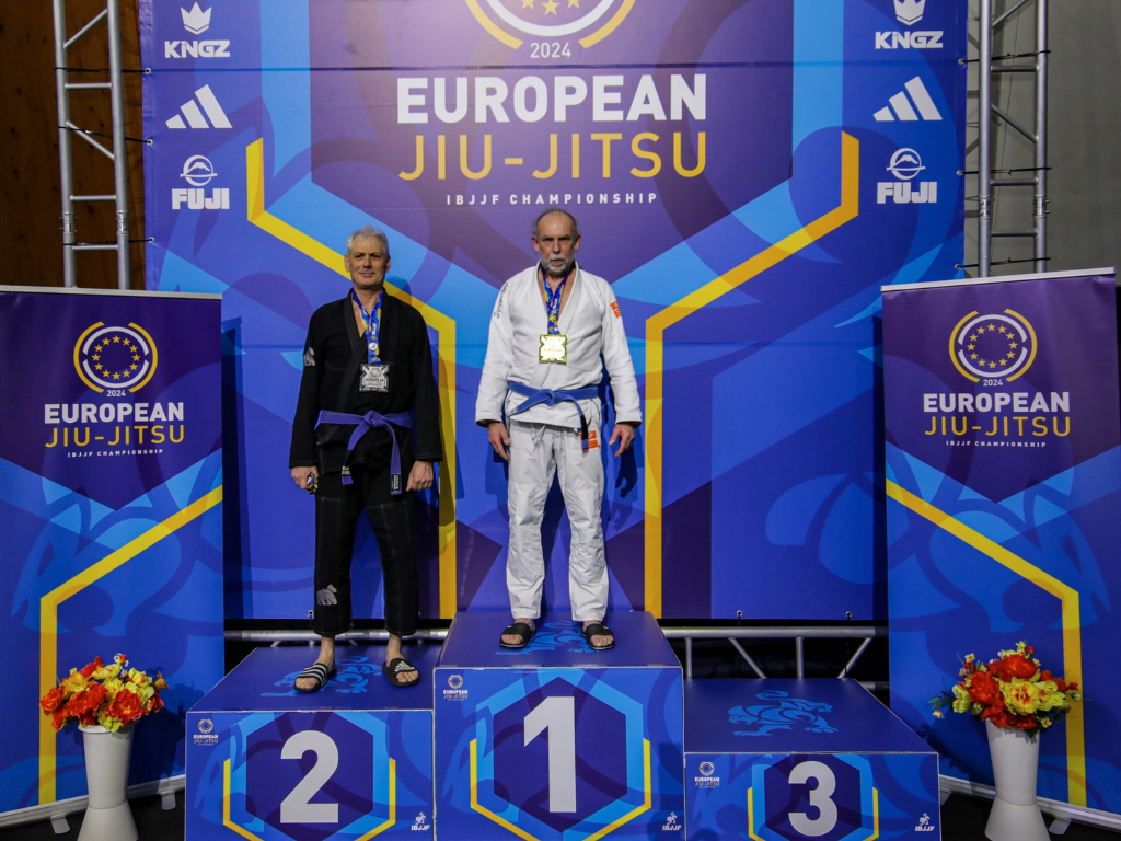 Richard stands in first place on a European Jiu-Jitsu podium